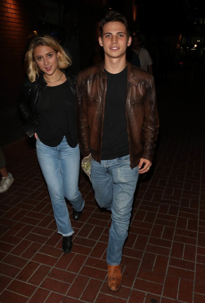 Image Credit: Getty Images/Star Max/GC Images/Hollywood To You | Tanner Buchanan and Lizzie Broadway are seen on July 20, 2019 at Comic-Con in San Diego