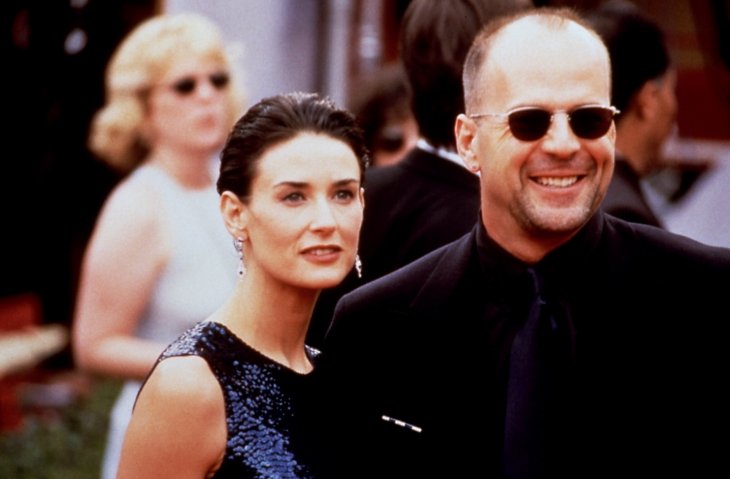 Image Credits: Shutterstock / Everett Collection | Demi Moore, Bruce Willis at the Emmy Awards, 1997.