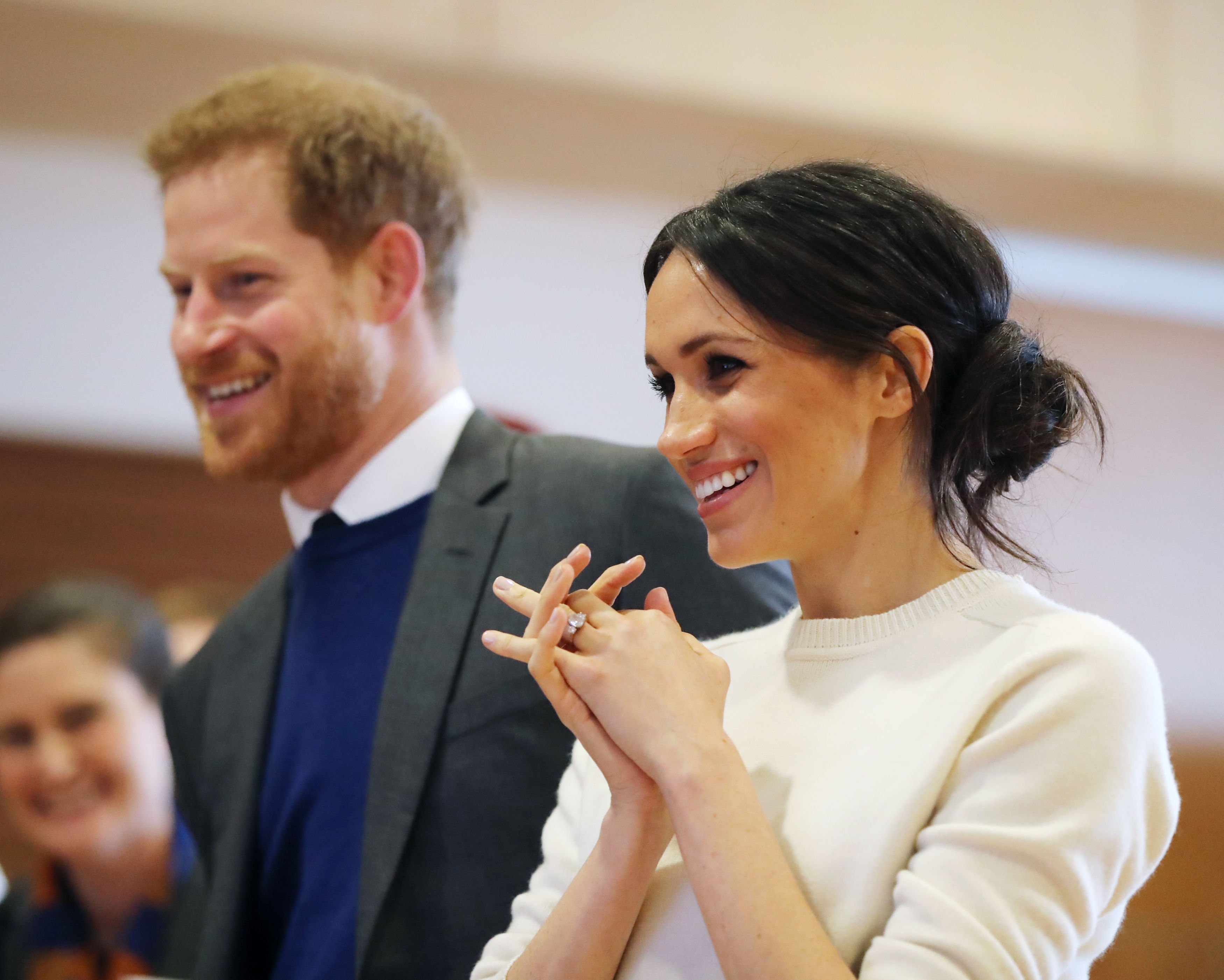 Image Credits: Getty Images / Niall Carson - Pool | Prince Harry and Meghan Markle during a visit to Catalyst Inc science park in Belfast where they met some of Northern Ireland's brightest young entrepreneurs on March 23, 2018 in Belfast, Nothern Ireland.
