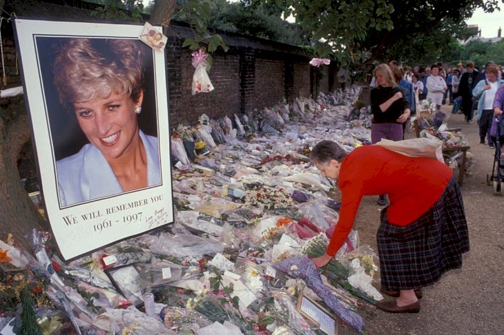 Image Credit: Getty Images/Universal Images Group Editorial | Flowers and tributes for the late Princess Diana outside Kensington Palace