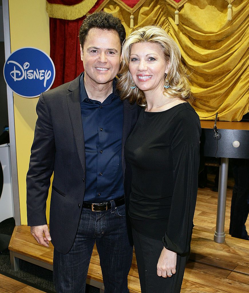 Image Credit: Getty Images / Donny Osmond and his wife Debbie Osmond attend "Dance Star Mickey" at the Mattel Inc. Showroom, 2010.