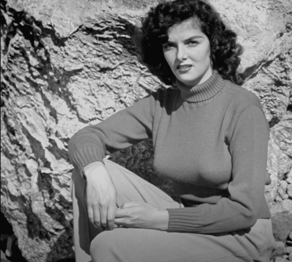 Image Source: Youtube/Cladrite Radio/Jane wearing a turtleneck sweater
