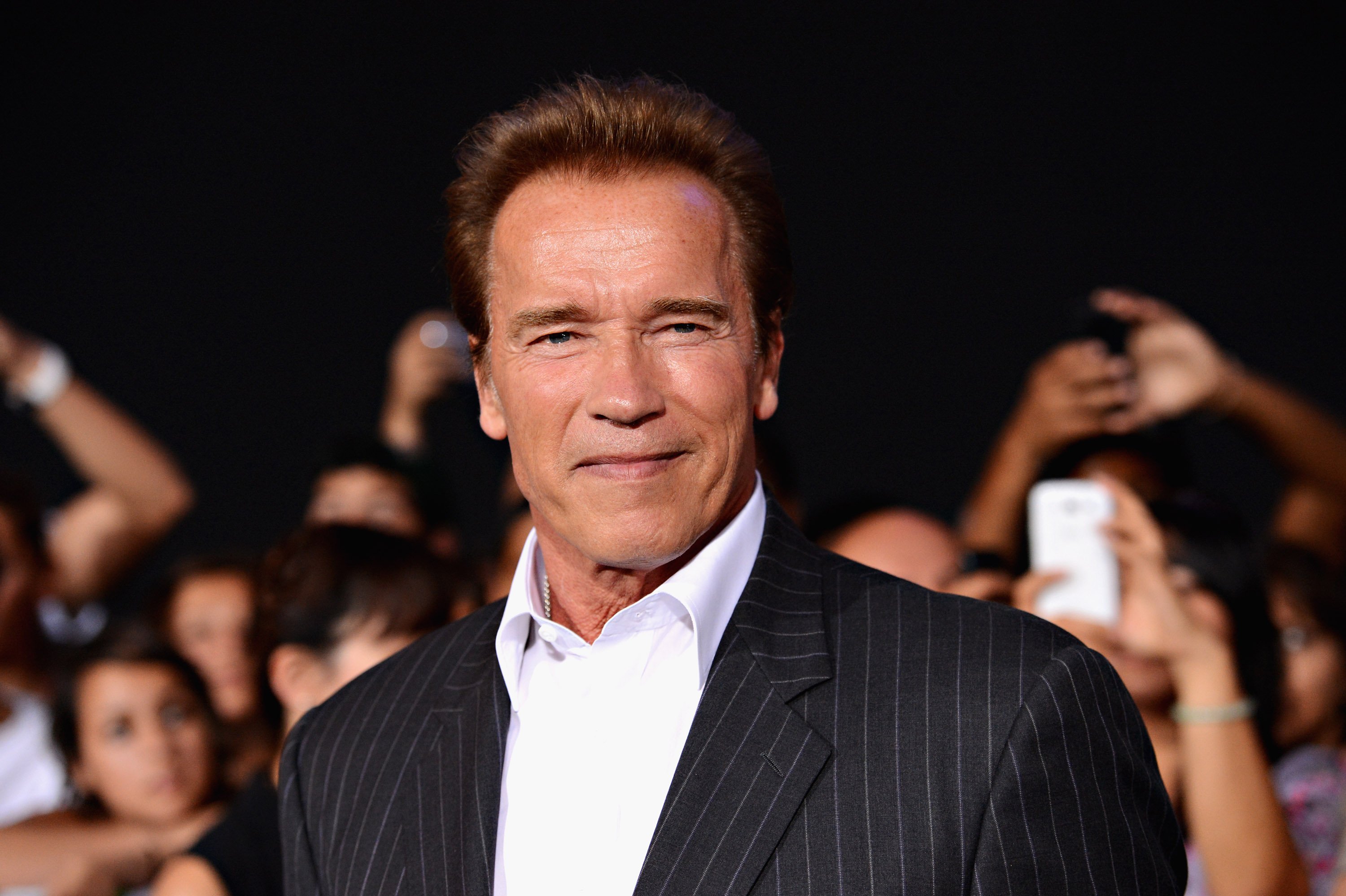Image Credits: Getty Images / Jason Merritt | Actor Arnold Schwarzenegger arrives at Lionsgate Films' "The Expendables 2" premiere on August 15, 2012 in Hollywood, California. Image Credits: Getty Images / Jason Merritt | Actor Arnold Schwarzenegger arrives at Lionsgate Films' "The Expendables 2" premiere on August 15, 2012 in Hollywood, California.