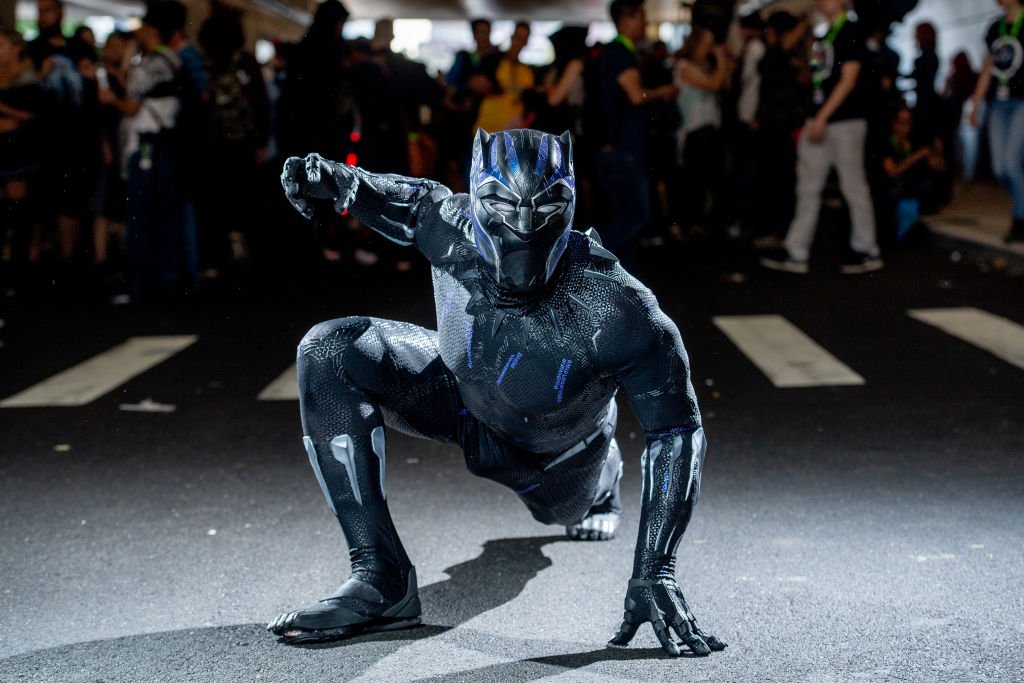 Image Credits: Getty Images / Roy Rochlin | A fan cosplays as Black Panther from the Marvel Universe during the 2018 New York Comic-Con at Javits Center on October 7, 2018 in New York City.