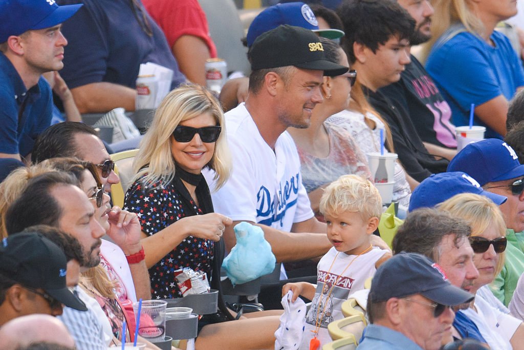 Image Credit: Getty Images / Fergie, Josh Duhamel and Axl Jack Duhamel attend a baseball game at Dodger Stadium on August 7, 2016 in Los Angeles.
