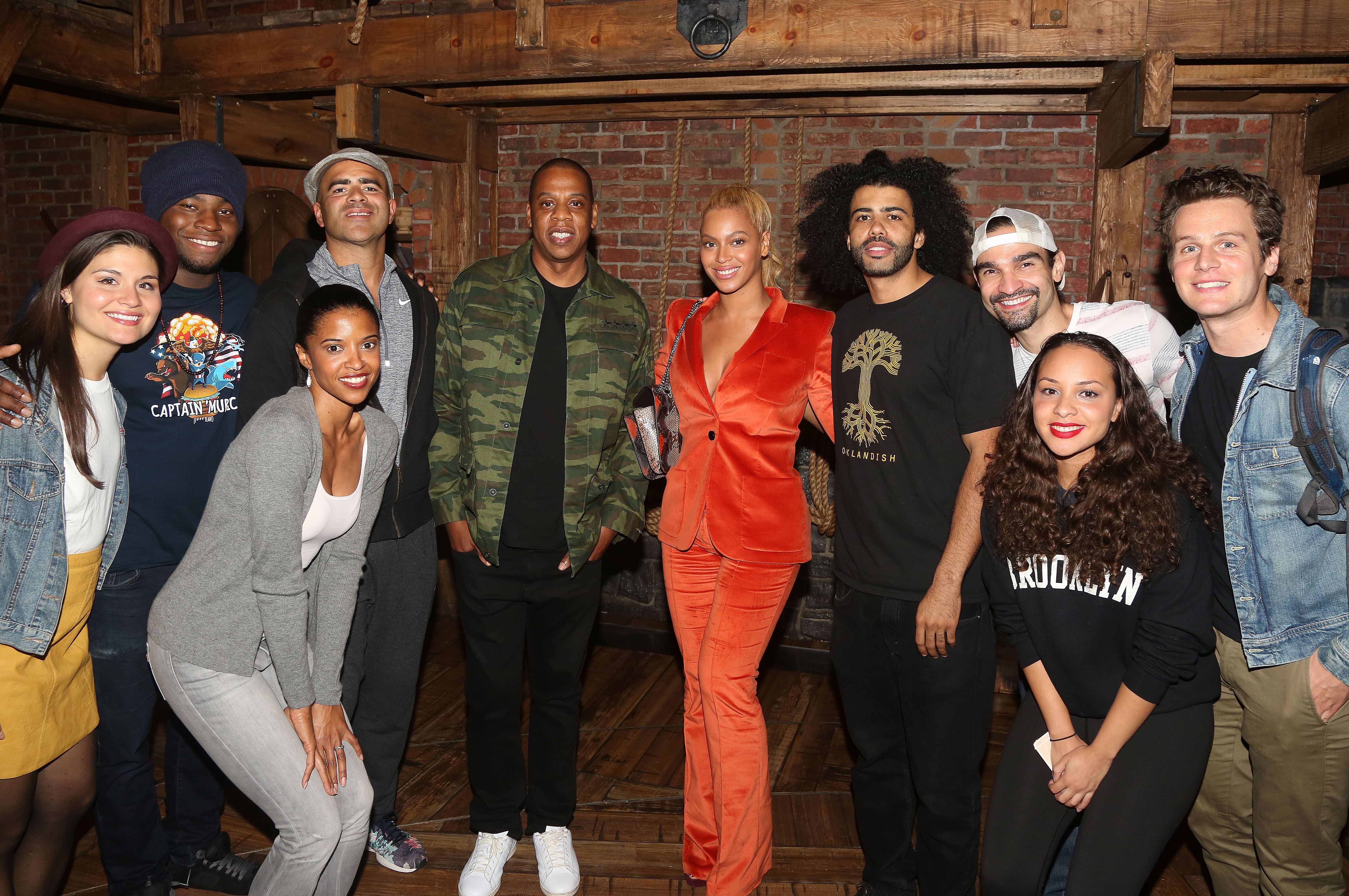 Stars pose backstage at the hit musical "Hamilton" on Broadway / Getty Images