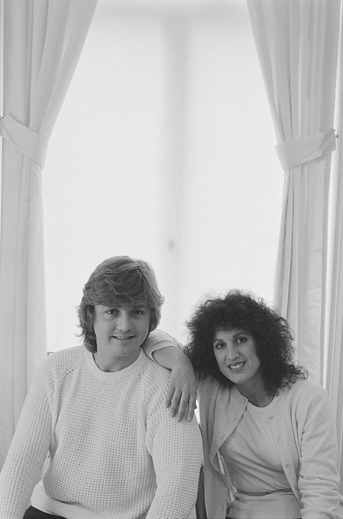 Image Credit: Getty Images/Popperfoto via Getty Images/United News | The Emmanuels, the couple designers that made Diana's dress