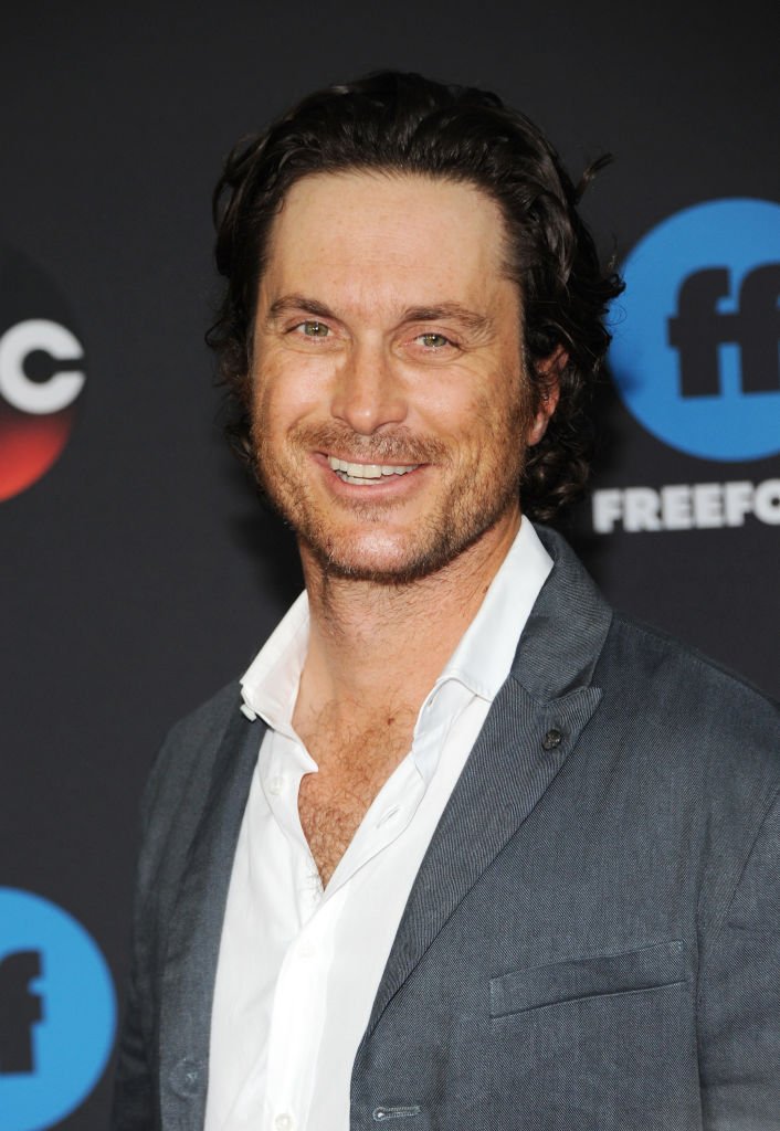 Image Credits: Getty Images / Desiree Navarro / WireImage | Actor Oliver Hudson attends during 2018 Disney, ABC, Freeform Upfront on May 15, 2018 in New York City.