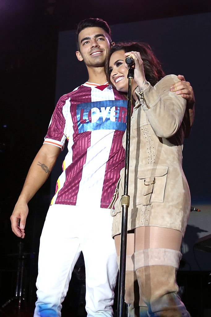 Image Source: Getty Images/Jonathan Leibson/Recording artists Joe Jonas of DNCE (L) and Demi Lovato perform onstage during the Demi Lovato and DNCE Concert for Marriott Rewards members
