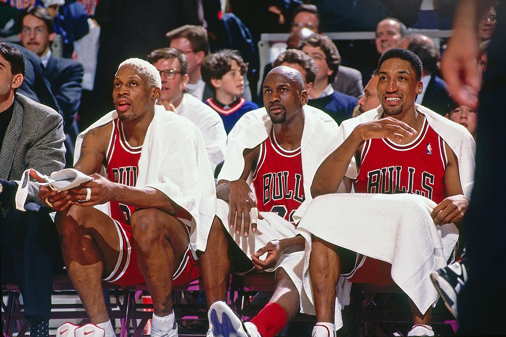 Image Credits: Getty Images / Nathaniel S. Butler / NBAE | Dennis Rodman #91, Michael Jordan #23 and Scottie Pippen #33 of the Chicago Bulls looks on against the New York Knicks on January 23, 1996 at Madison Square Garden in New York City.
