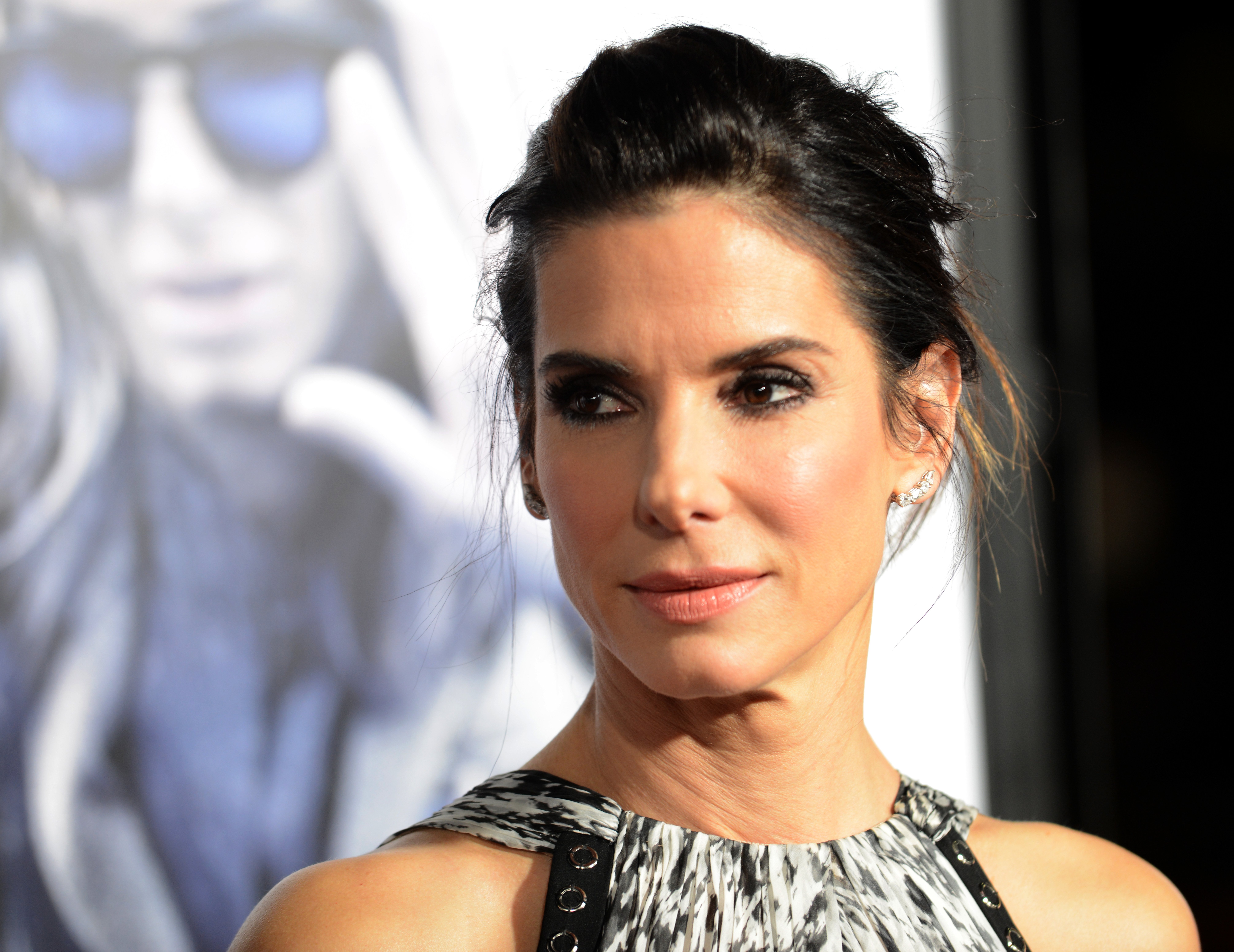 Image Credits: Getty Images / Albert L. Ortega | Actress Sandra Bullock arrives for the premiere of Warner Bros. Pictures' "Our Brand Is Crisis" held at TCL Chinese Theatre on October 26, 2015 in Hollywood, California.