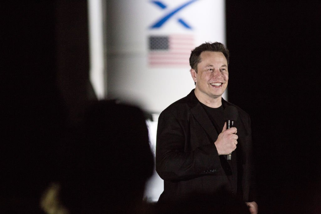Image Credit: Getty Images / Elon Musk, chief executive officer of Space Exploration Technologies Corp. (SpaceX) and Tesla Inc., speaks during an event at the SpaceX launch facility in Cameron County, Texas, U.S., on Saturday, Sept. 28, 2019.