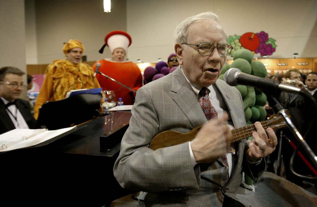 Image Credit: Getty Images / Warren Buffett, chairman of Berkshire Hathaway, plays the ukulele for a crowd of shareholders at the Fruit of the Loom booth during the Berkshire Hathaway annual meeting in Omaha, Nebraska, Saturday, April 30, 2005. Image Credit: Getty Images / Warren Buffett, chairman of Berkshire Hathaway, plays the ukulele for a crowd of shareholders at the Fruit of the Loom booth during the Berkshire Hathaway annual meeting in Omaha, Nebraska, Saturday, April 30, 2005.