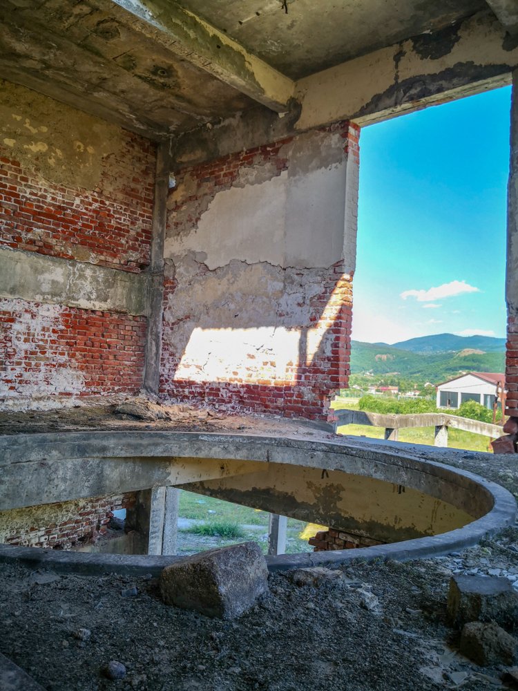 Abandoned Paper Mill Factory in Berane, Montenegro | Shutterstock Abandoned Paper Mill Factory in Berane, Montenegro | Shutterstock