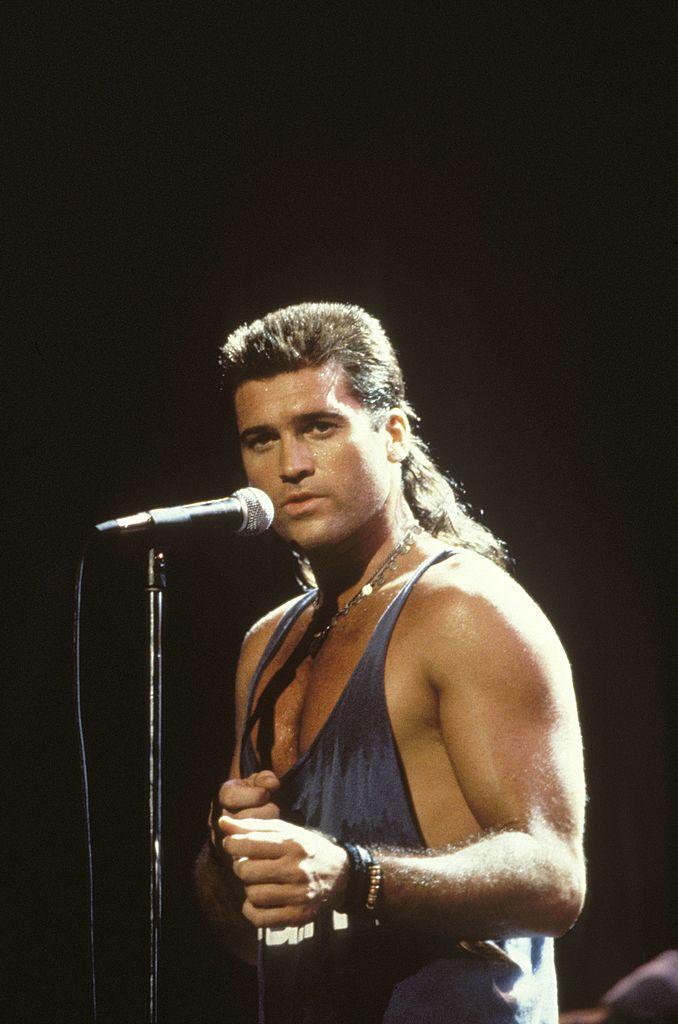 Image Credits: Getty Images / Ebet Roberts | Billy Ray Cyrus performing