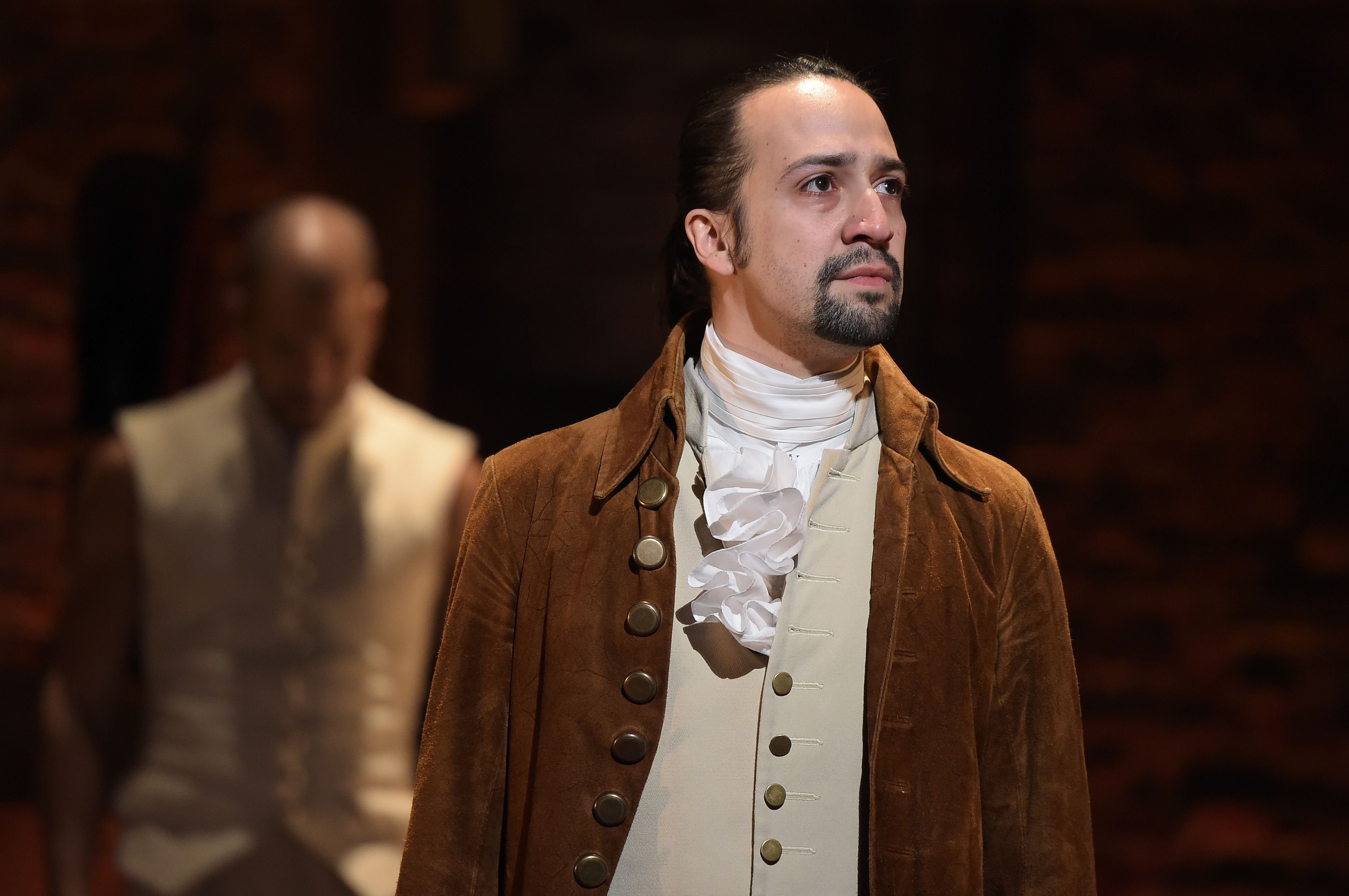 Actor, composer Lin-Manuel Miranda is seen on stage during "Hamilton" GRAMMY performance / Getty Images