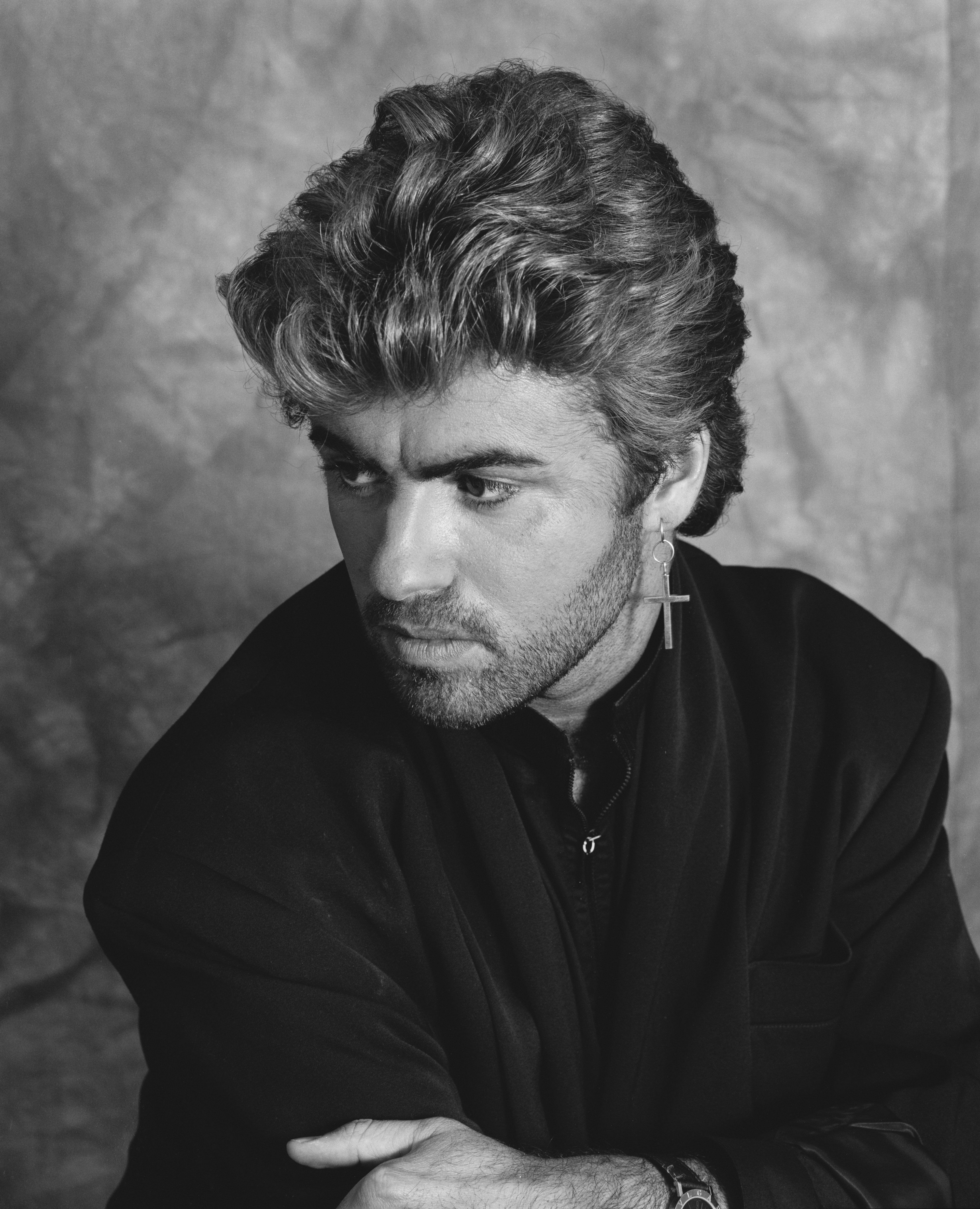 Image Source: Getty Images/A portrait of George Michael