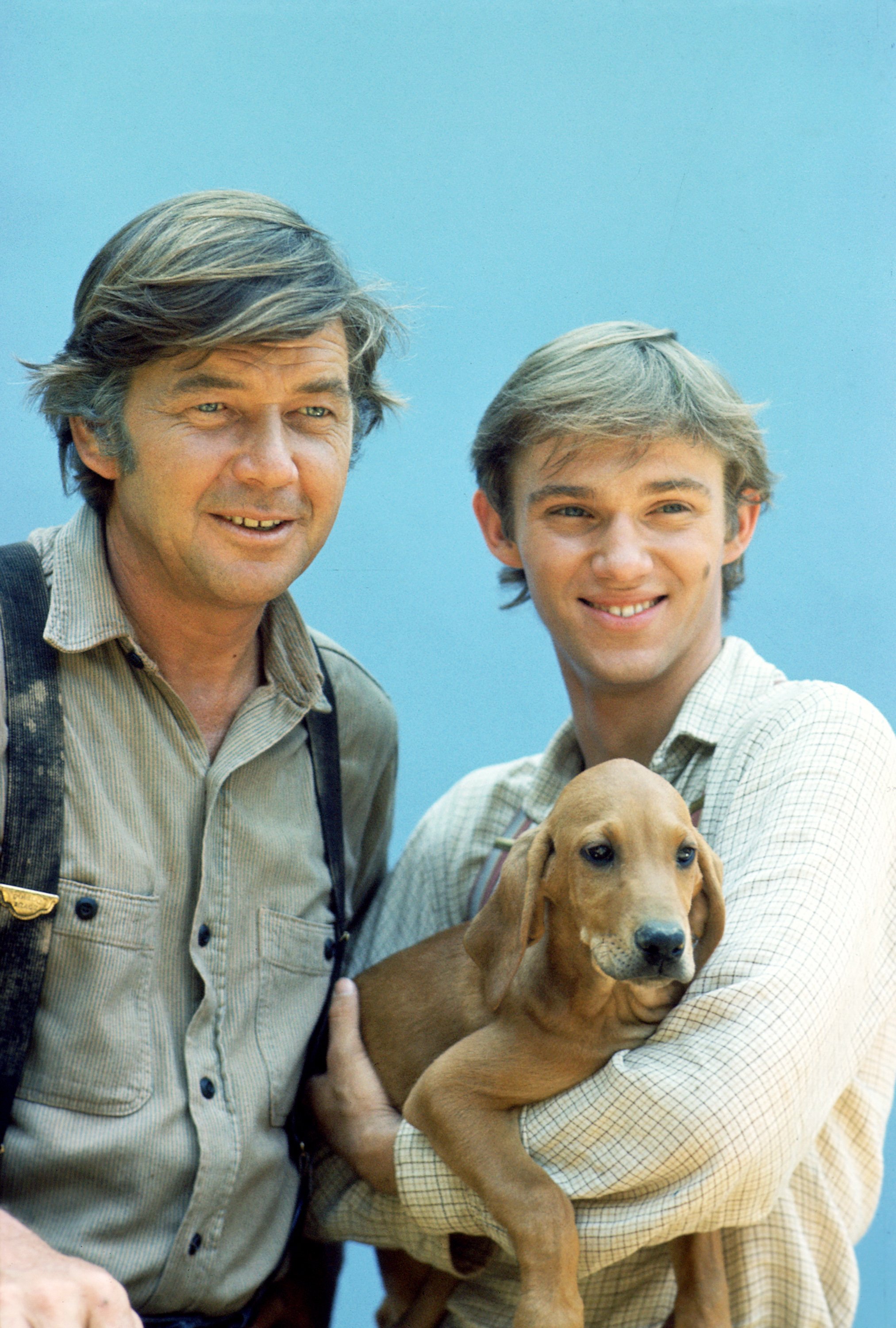 Image Credits: Getty Images / CBS | From left to right, Ralph Waite (as John Walton) and Richard Thomas (as John Boy Walton), in THE WALTONS. 1974.