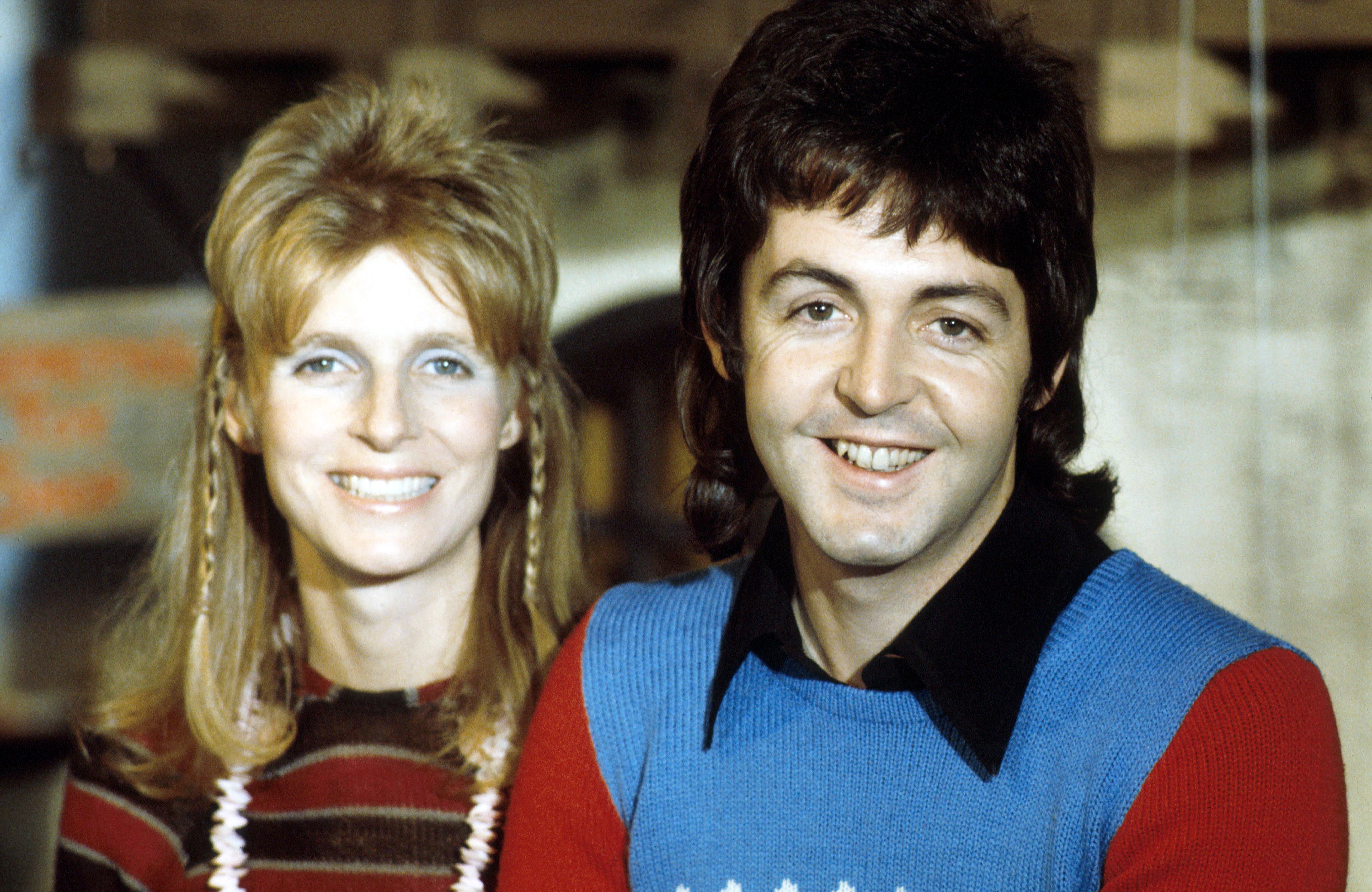 Image Credits: Getty Images / Michael Putland | Linda McCartney (1941 - 1998) and husband Paul McCartney of Wings posed in 1973.