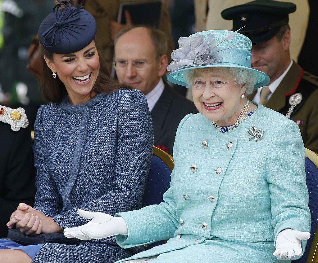 Image Credit: Getty Images / Catherine, Duchess of Cambridge and Queen Elizabeth II watch part of a children's sports event on June 13, 2012 in Nottingham, England.