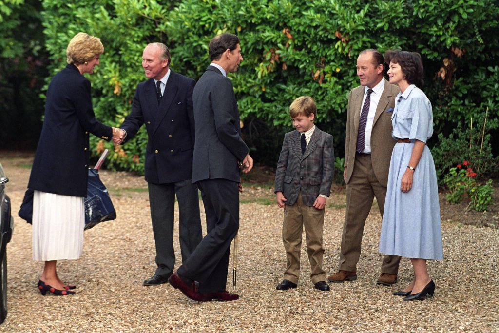 Image Credit: Getty Images / Prince William is welcomed to Ludgrove Preparatory School near Wokingham, Berkshire by joint headmaster Nichol Marston and Janet Barber, wife of the other headmaster, Gerald Barber.