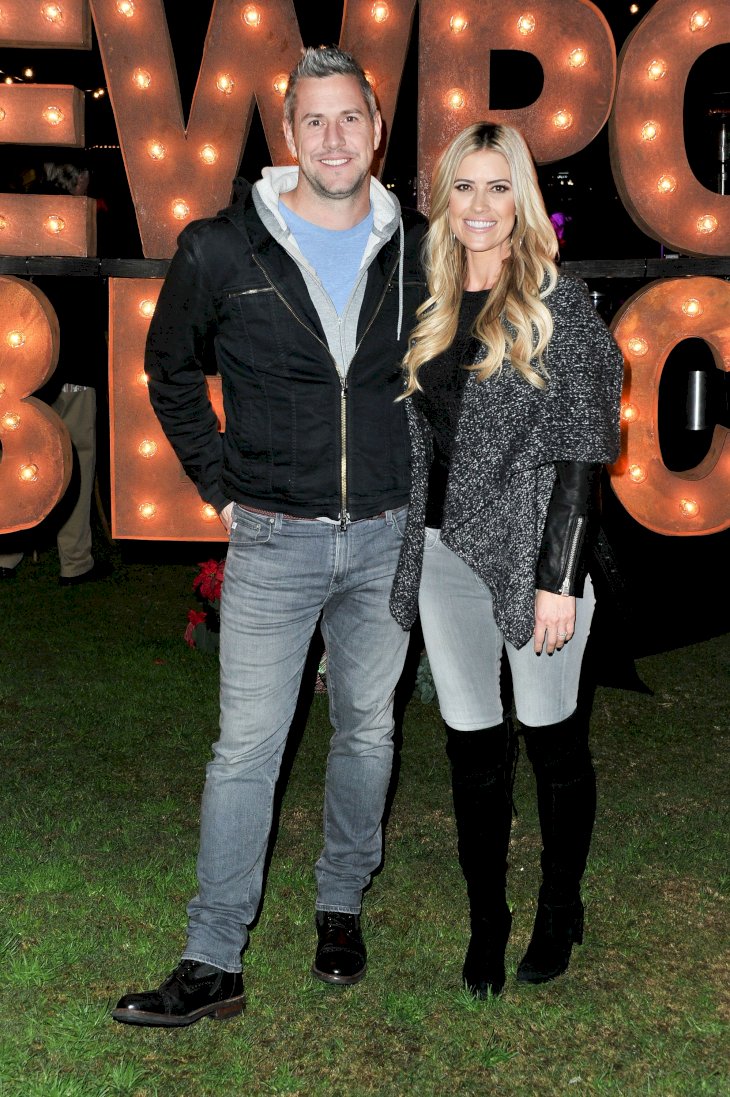 Image Credit: Getty Images/Allen Berezovsky | Grand Marshal Christina Anstead and Ant Anstead attend the 111th Annual Newport Beach Christmas Boat Parade opening night at Marina Park