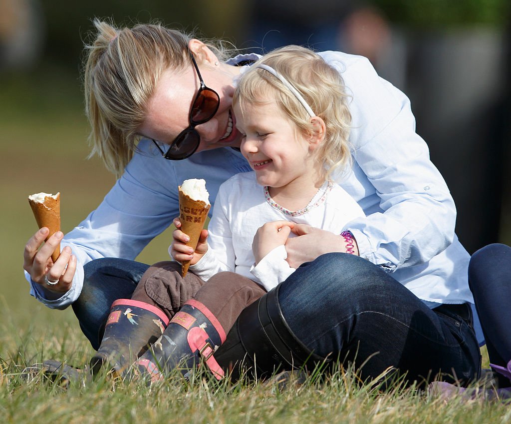 Image Credit: Getty Images / Autumn Phillips and daughter Isla Phillips eat ice creams as they watch the show jumping at Gatcombe Park, Minchinhampton on March 25, 2016 in Stroud, England. Image Credit: Getty Images / Autumn Phillips and daughter Isla Phillips eat ice creams as they watch the show jumping at Gatcombe Park, Minchinhampton on March 25, 2016 in Stroud, England.