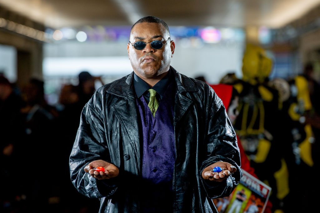 Image Credits: Getty Images / Roy Rochlin | A fan cosplays as Morpheus from The Matrix during the 2018 New York Comic-Con at Javits Center on October 7, 2018 in New York City.