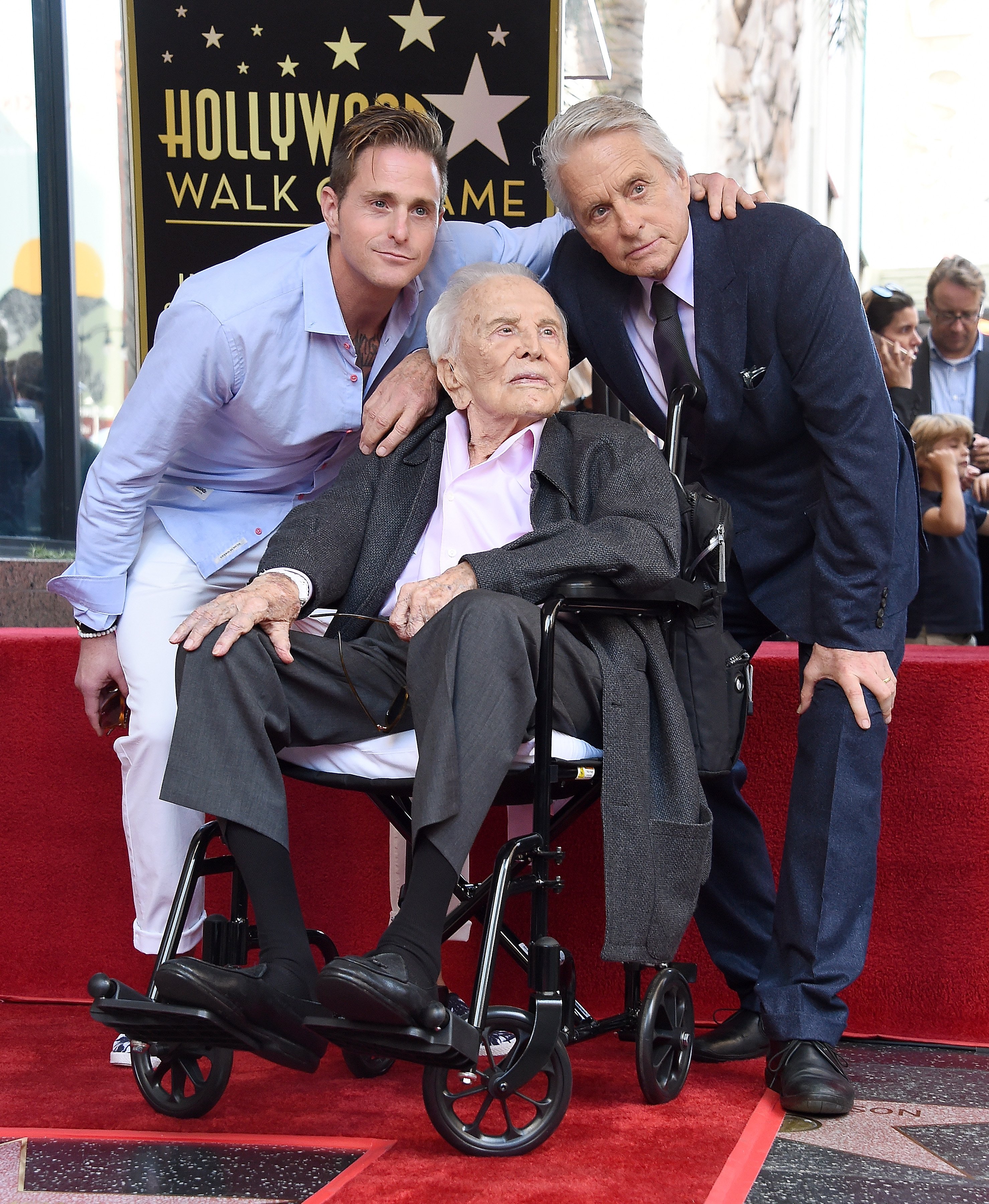 Image Credits: Getty Images | Michael with his father Kirk and son Cameron Image Credits: Getty Images | Michael with his father Kirk and son Cameron