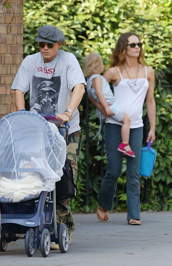 Johnny and Vanessa with their children / Getty Images