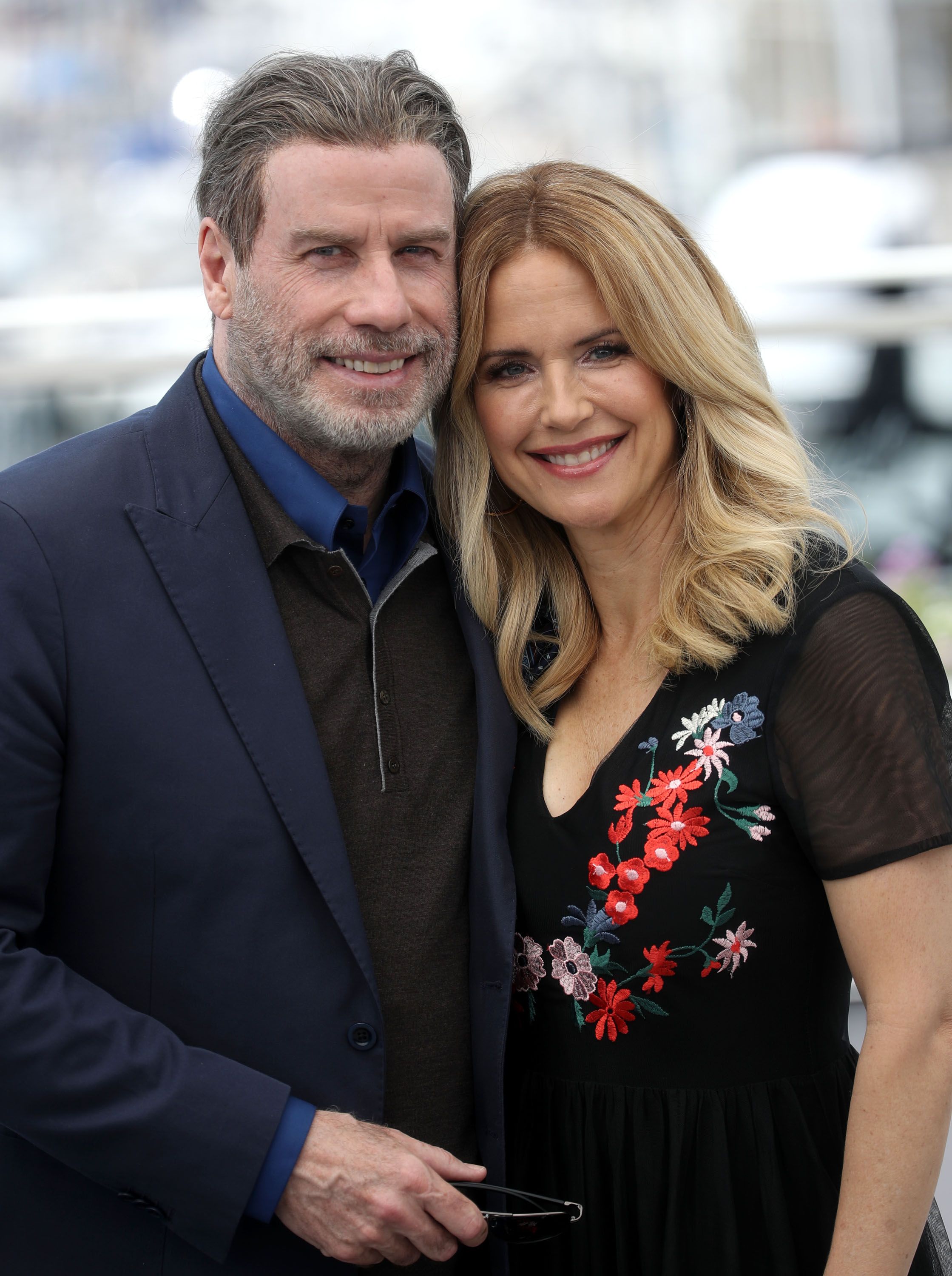 Image Credit: Getty Images / John Travolta and Kelly Preston attend the photocall for the "Gotti" during the 71st annual Cannes Film Festival at Palais des Festivals,2018.