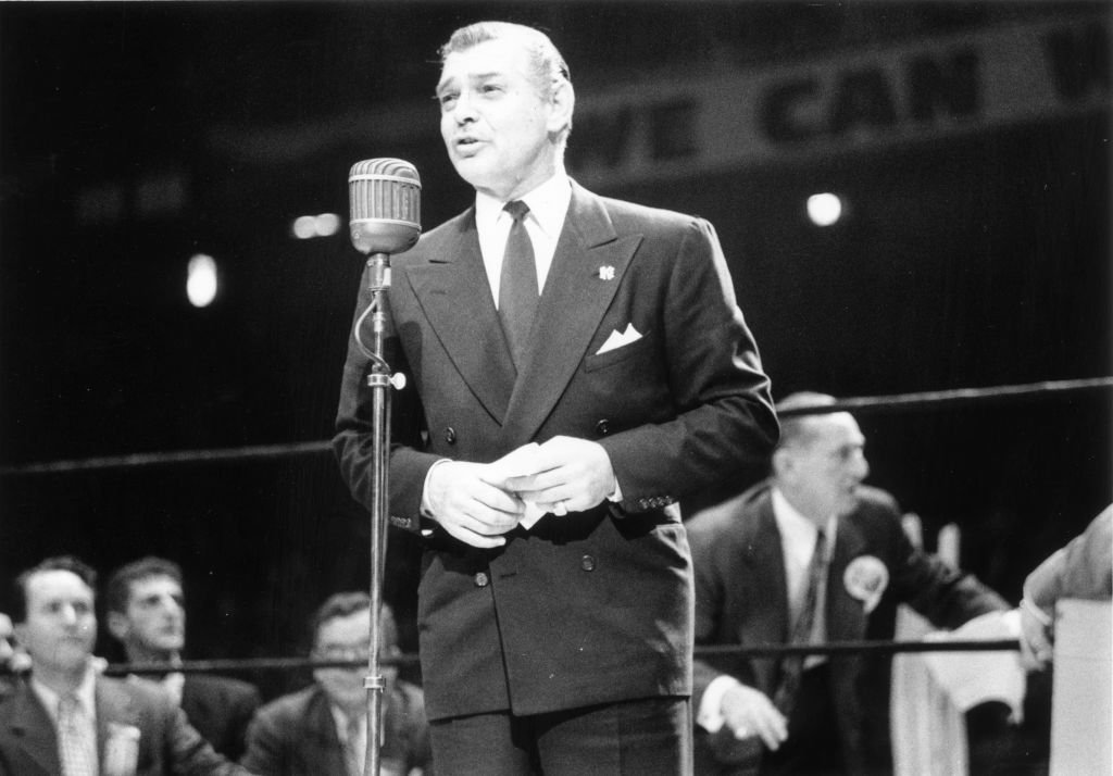 Image Credit: Getty Images / Actor Clark Gable also called The King of Hollywood poses for a picture while speaking on stage. Image Credit: Getty Images / Actor Clark Gable also called The King of Hollywood poses for a picture while speaking on stage.