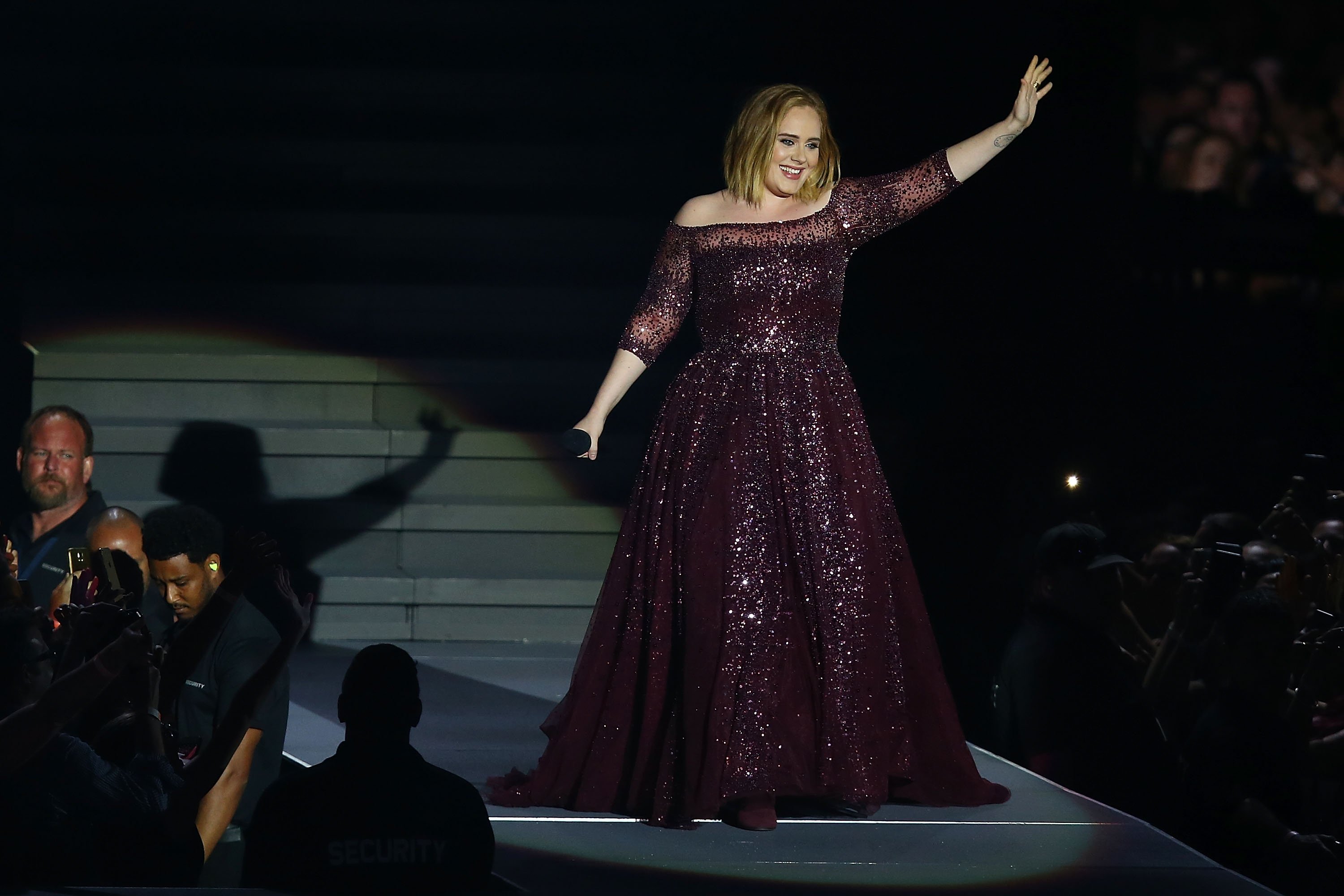 Image Credit: Getty Images / Adele performing at a concert. Image Credit: Getty Images / Adele performing at a concert.