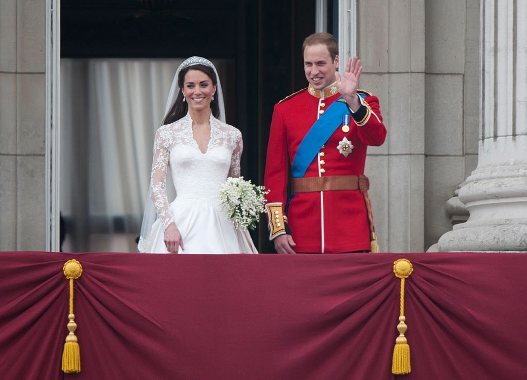 Image Credit: Getty Images / TRH Catherine, Duchess of Cambridge and Prince William, Duke of Cambridge on the balcony at Buckingham Palace, following their wedding at Westminster Abbey on April 29, 2011 in London, England.