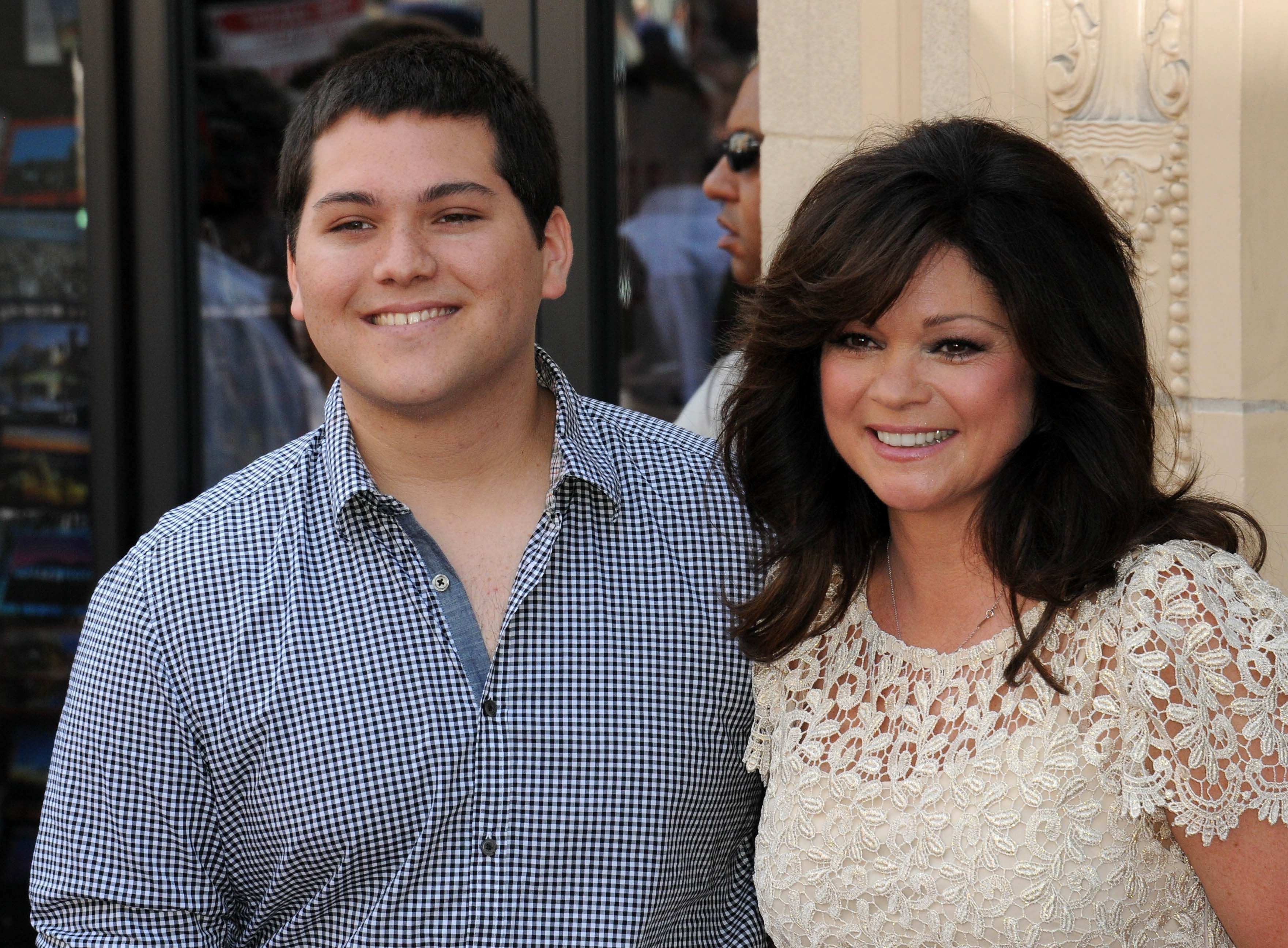 Image Credit: Getty Images / Actress Valerie Bertinelli (R) and son Wolfgang Van Halen as Valerie Bertinelli is honored on the Hollywood Walk Of Fame held on August 22, 2012 in Hollywood, California.