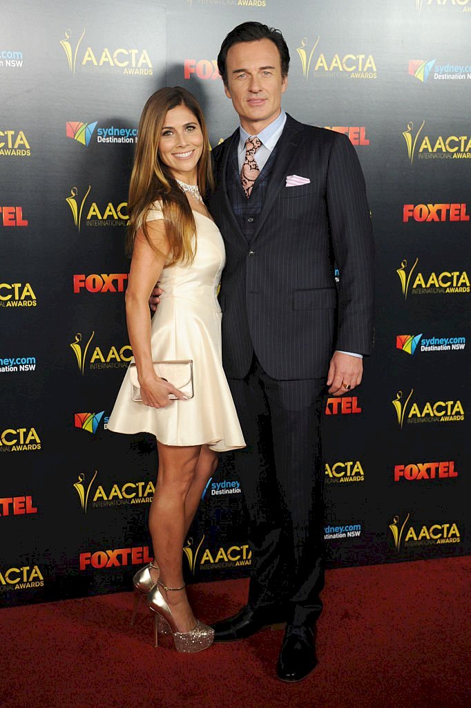 Image Credits: Getty Images / Gregg DeGuire / WireImage | Actor Julian McMahon and wife Kelly Paniagua arrive at the 6th AACTA International Awards at Avalon Hollywood on January 6, 2017 in Los Angeles, California. 