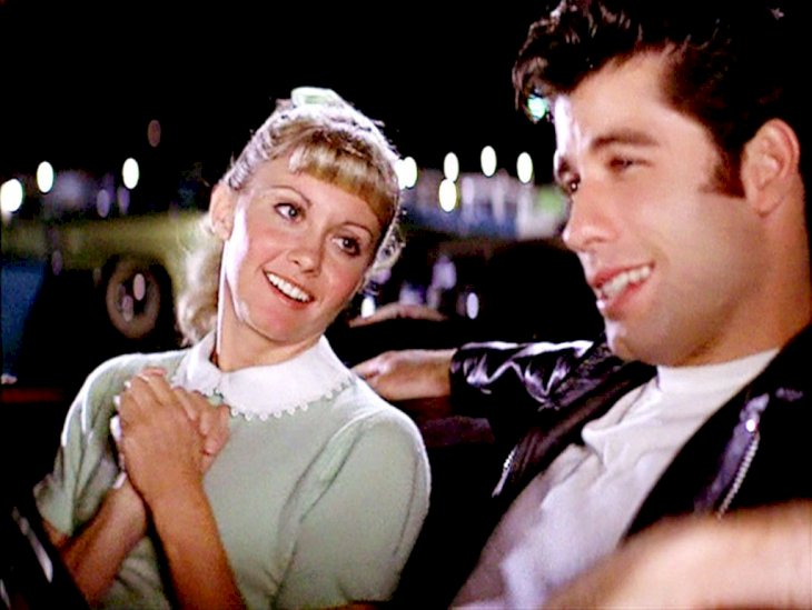 Image Credit: Getty Images/CBS via Getty Images | Olivia Newton-John as Sandy and John Travolta as Danny Zuko.