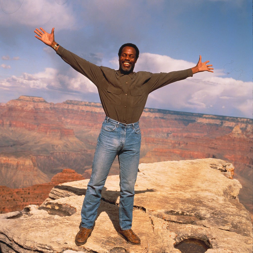 Image Source: Getty Images/Gary Moss| Danny Glover Standing on the Rim of the Grand Canyon Image Source: Getty Images/Gary Moss| Danny Glover Standing on the Rim of the Grand Canyon