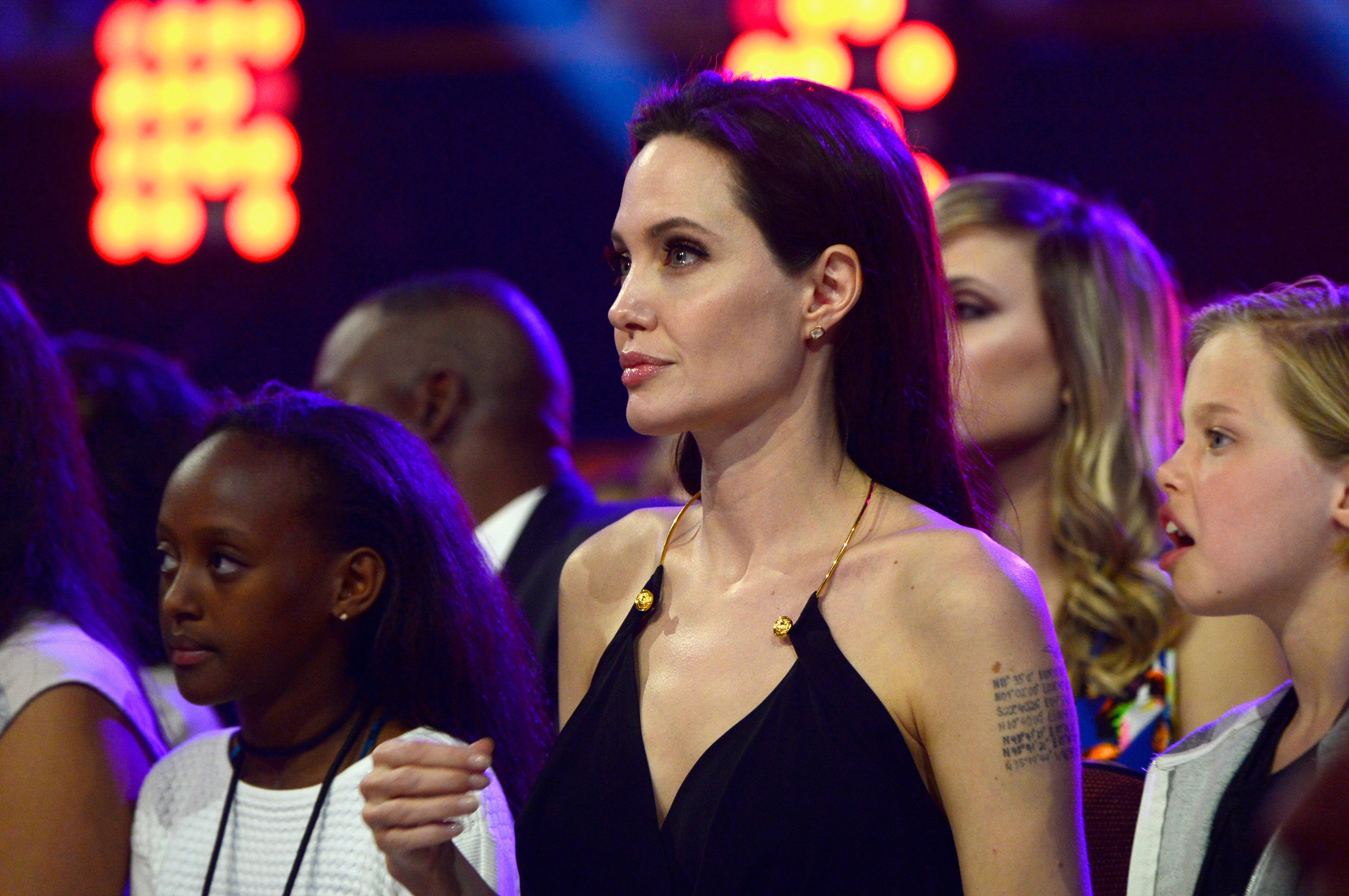 Image Credit: Getty Images/KCA2015/Frazer Harrison | Jolie and her daughters Zahara and Shiloh at the 2015 Nickelodeon Kid's Choice Awards