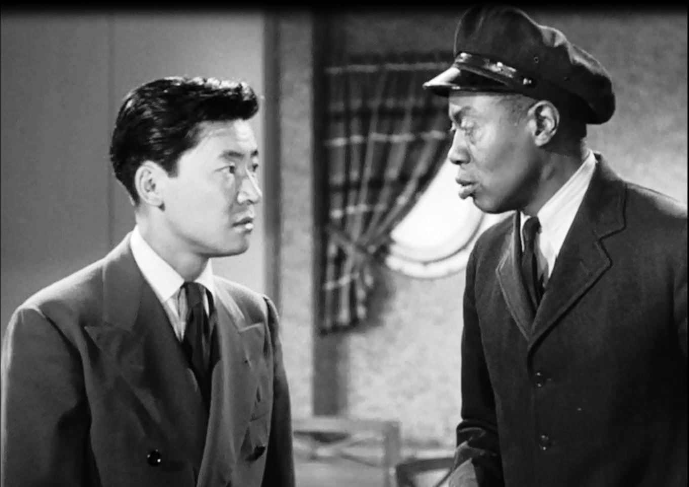 Victor Sen Yung (Left) | Image Source: Wikimedia Commons (Public Domain) Victor Sen Yung (Left) | Image Source: Wikimedia Commons (Public Domain)