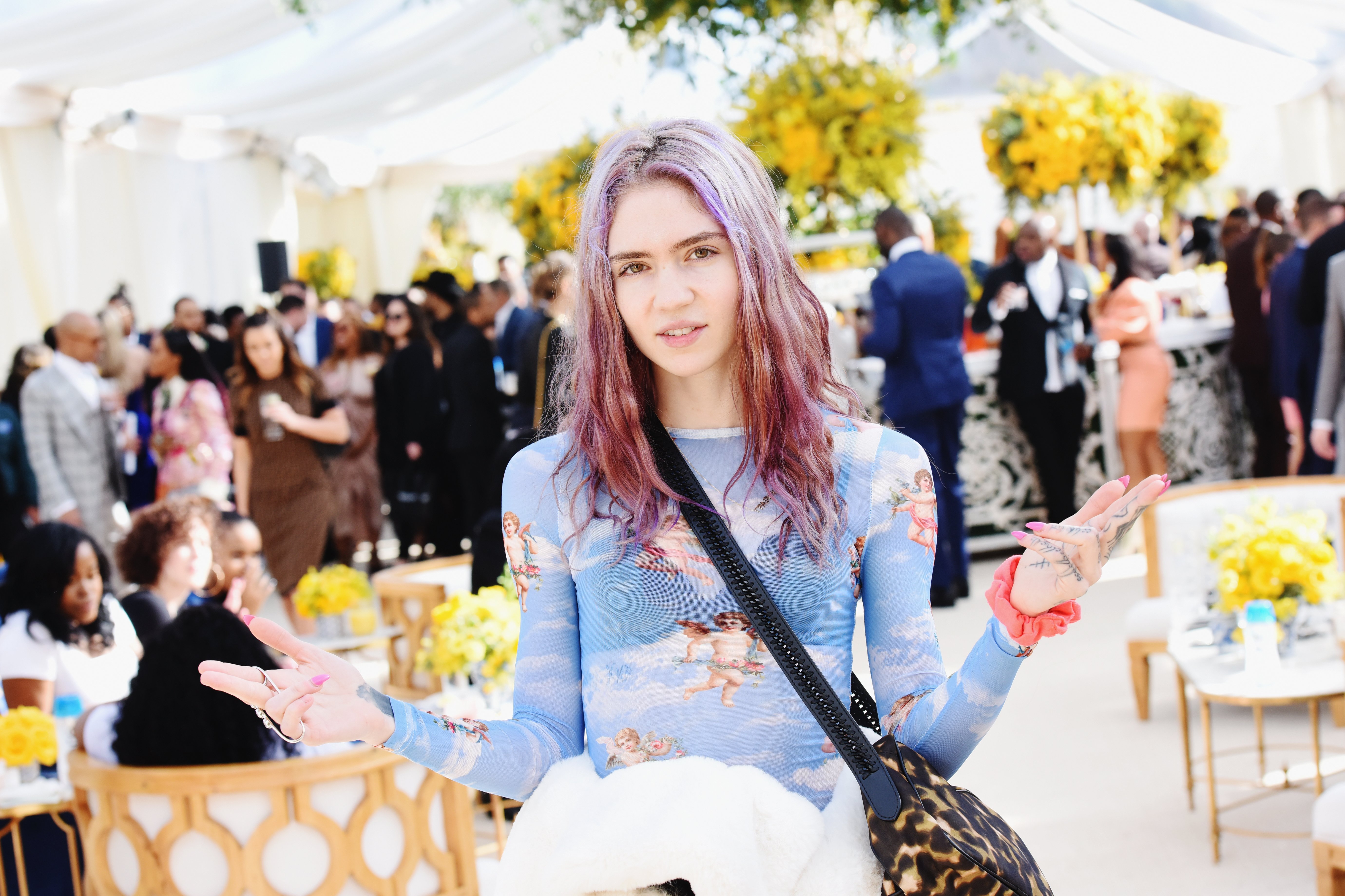Image Credit: Getty Images / Grimes attends 2019 Roc Nation THE BRUNCH on February 9, 2019 in Los Angeles, California.