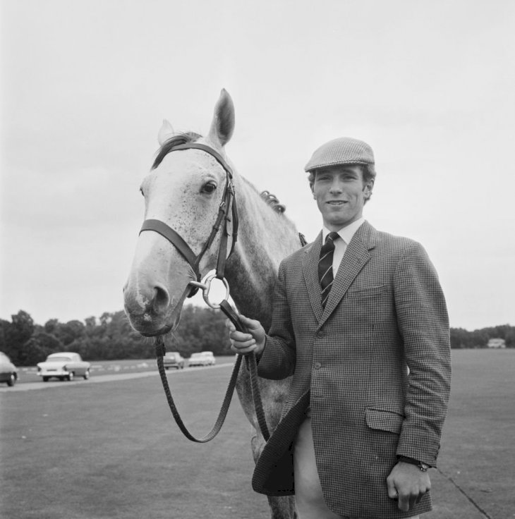 Image Credits: Getty Images / Evening Standard / Hulton Archive | British Army officer and equestrian Second Lieutenant Mark Phillips posed with his horse Chicago in England on 8th September 1970. Image Credits: Getty Images / Evening Standard / Hulton Archive | British Army officer and equestrian Second Lieutenant Mark Phillips posed with his horse Chicago in England on 8th September 1970.