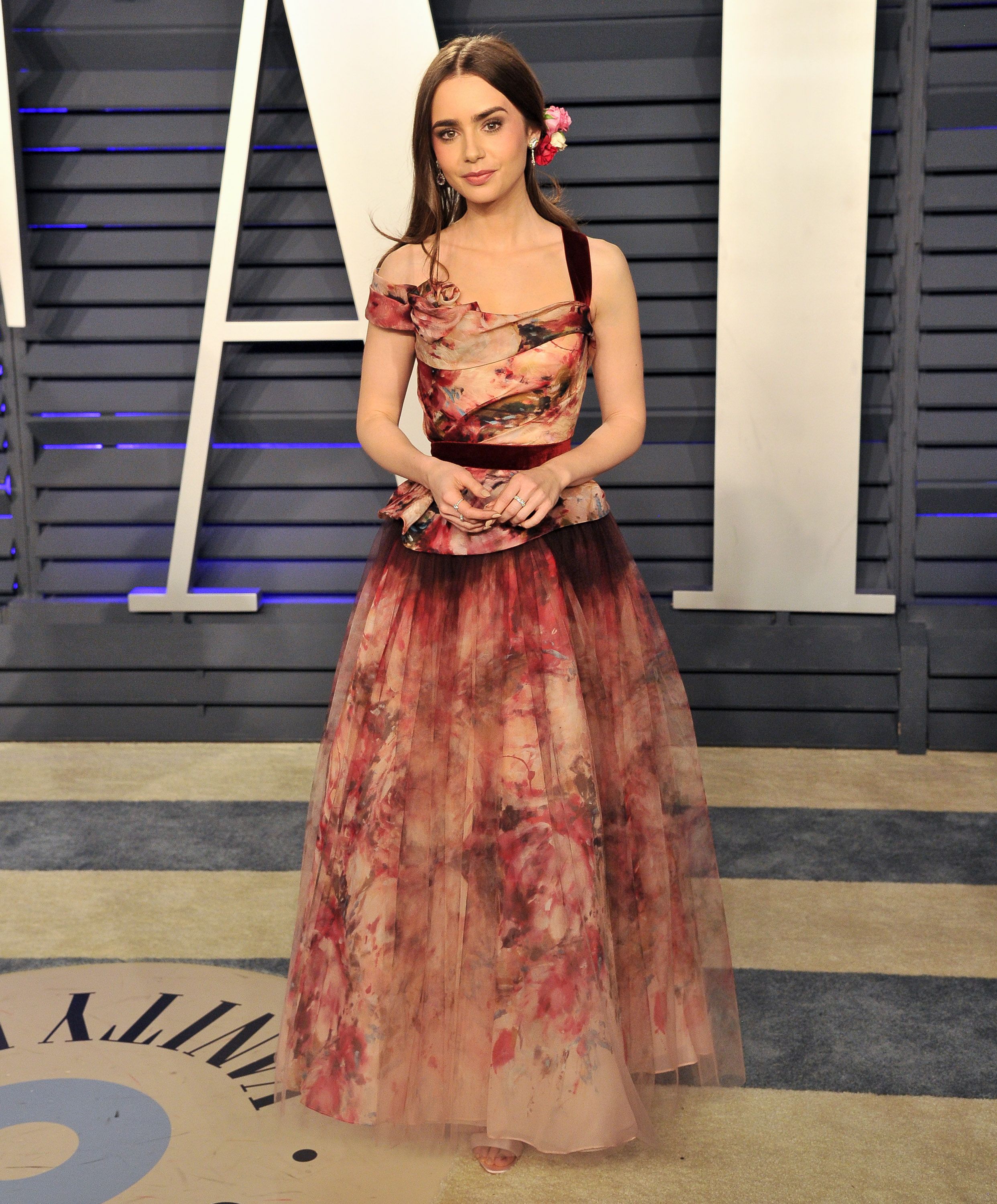 Actress Lily Collins, a daughter of famous musician Phil Collins / Getty Images