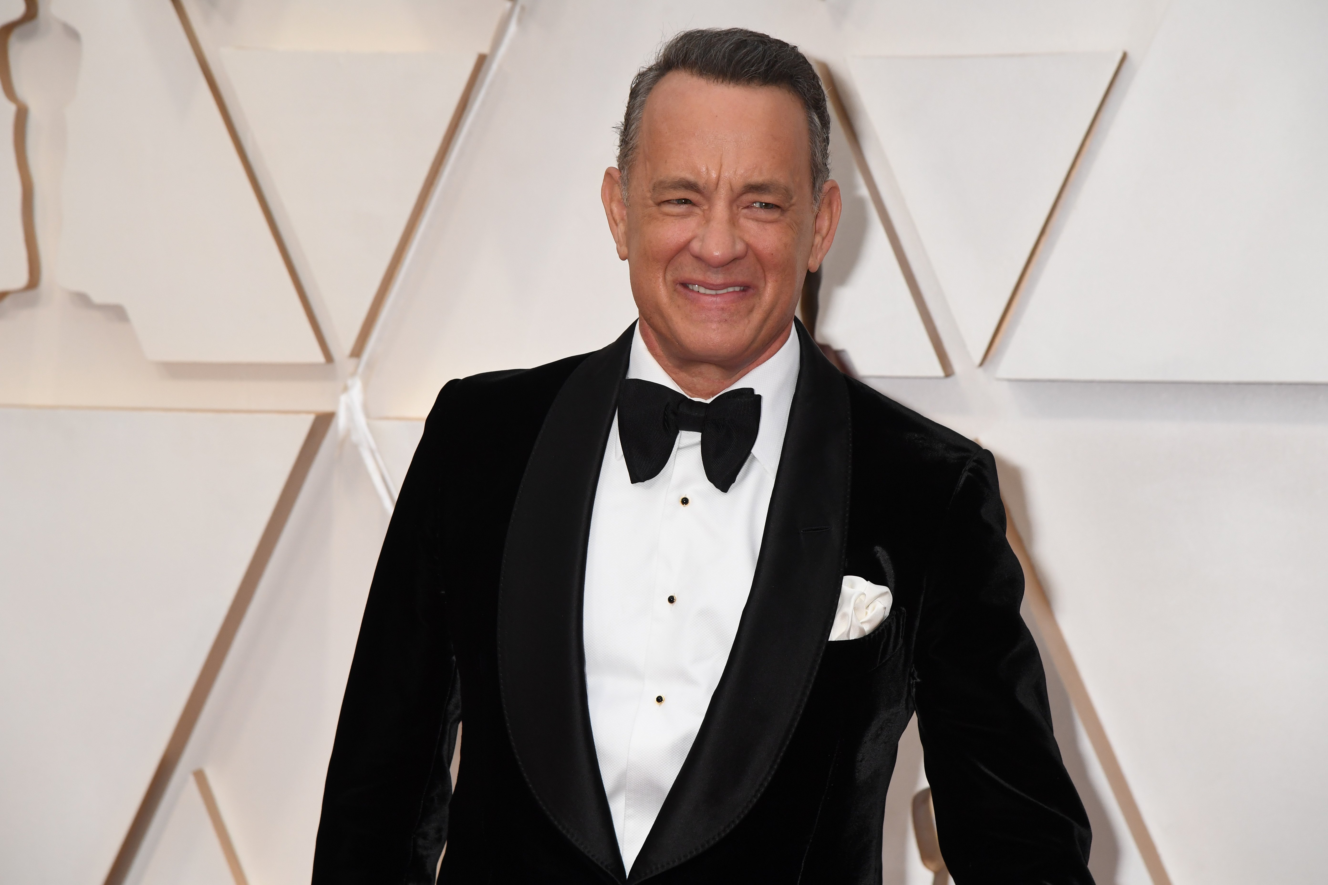 Image Credits: Getty Images / Jeff Kravitz / FilmMagic | Tom Hanks attends the 92nd Annual Academy Awards at Hollywood and Highland on February 09, 2020 in Hollywood, California.