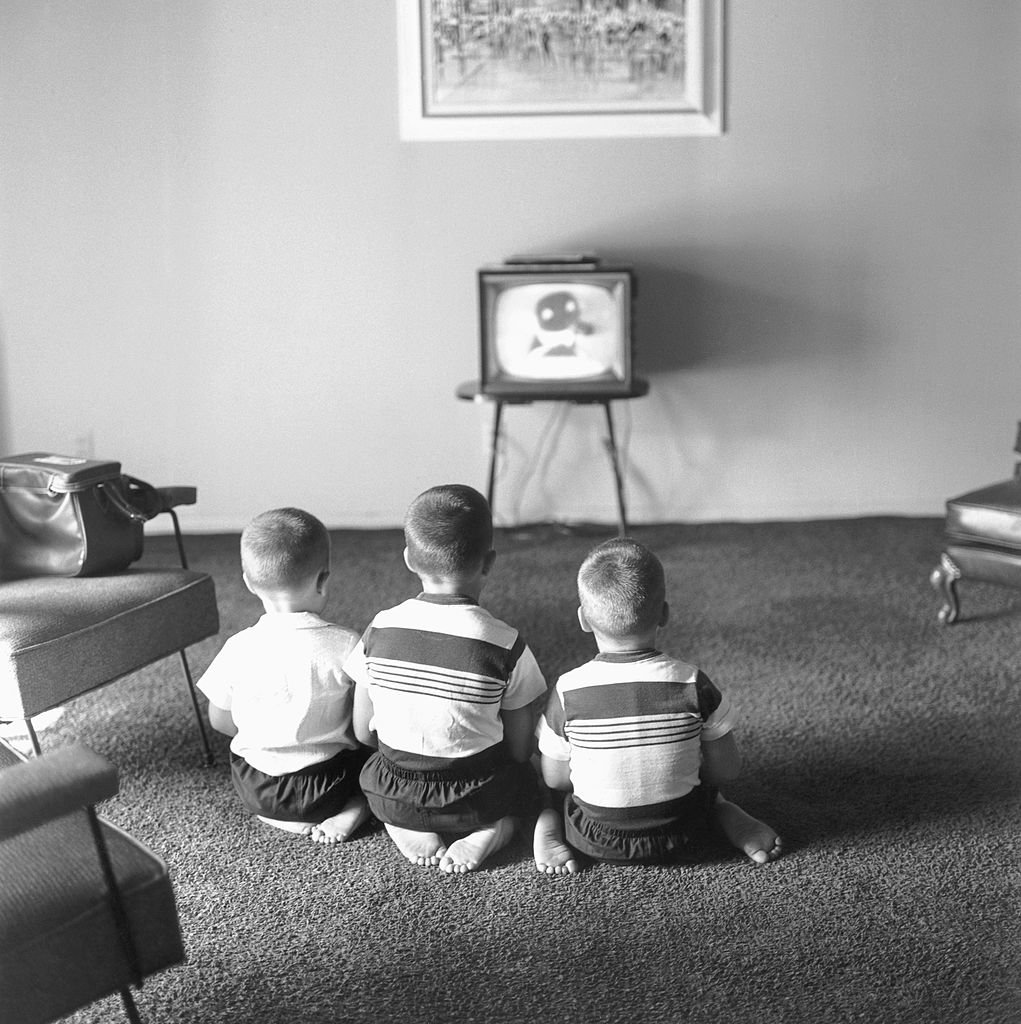 Image Credits: Getty Images / Michael Ochs Archives | Johnny's three sons watching TV at home, L-R: Cory, Christopher, Richard.
