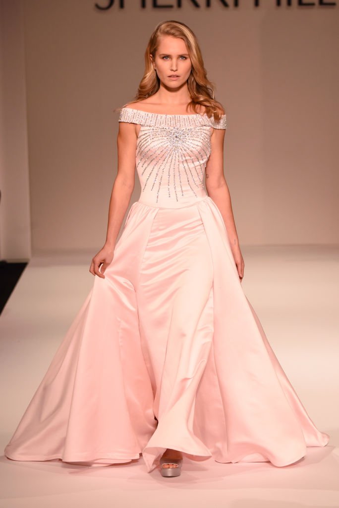 Image Credits: Getty Images / Albert Urso | Sailor Lee Brinkley-Cook walks the runway during the NYFW Sherri Hill Runway Show on February 9, 2018 in New York City. Image Credits: Getty Images / Albert Urso | Sailor Lee Brinkley-Cook walks the runway during the NYFW Sherri Hill Runway Show on February 9, 2018 in New York City.