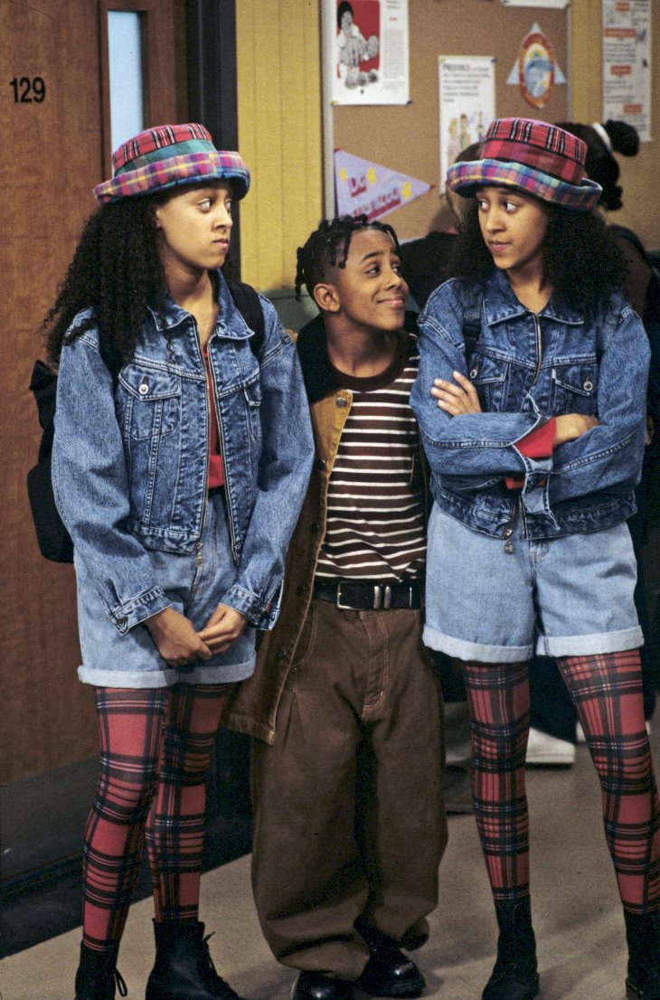 Image Credit: Getty Images / Tia and Tamera Mowry with Marques Houston.