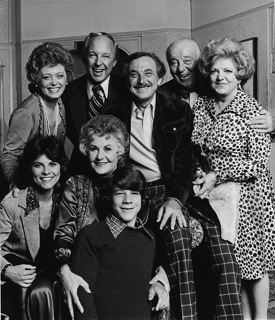 Image Credits: Getty Images / CBS Photo Archive | Promotional portrait of the cast of the television series, 'Maude,' 1976. Top (L-R): Rue McLanahan, Conrad Bain, Bill Macy, J. Pat O'Malley, Hermione Baddeley. Front (L-R): Adrienne Barbeau, Beatrice Arthur and Brian Morrison. Image Credits: Getty Images / CBS Photo Archive | Promotional portrait of the cast of the television series, 'Maude,' 1976. Top (L-R): Rue McLanahan, Conrad Bain, Bill Macy, J. Pat O'Malley, Hermione Baddeley. Front (L-R): Adrienne Barbeau, Beatrice Arthur and Brian Morrison.