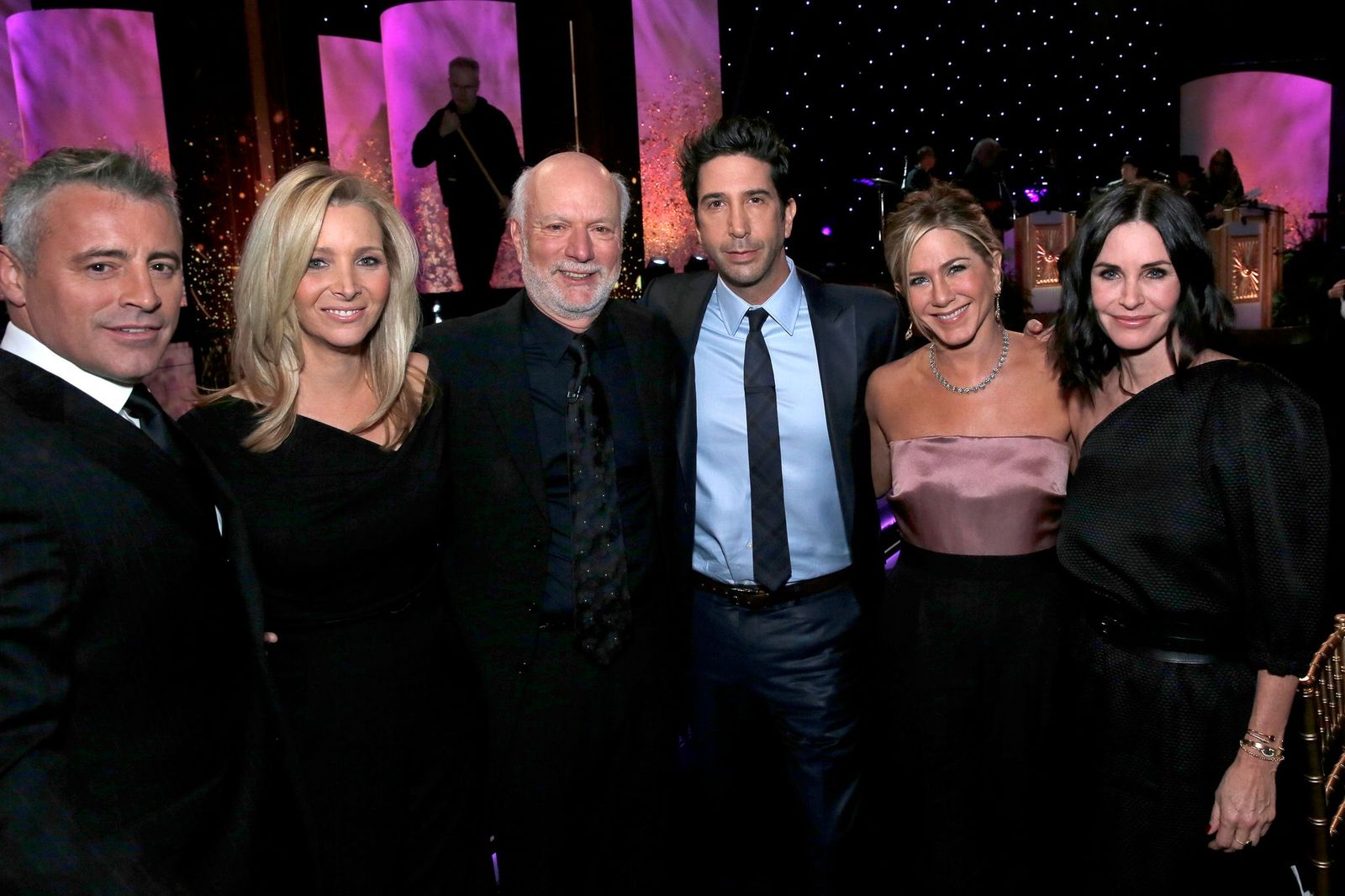 MUST SEE TV: AN ALL-STAR TRIBUTE TO JAMES BURROWS -- Pictured: (l-r) Matt LeBlanc, Lisa Kudrow, James Burrows, David Schwimmer, Jennifer Aniston, Courteney Cox -- (Photo by: Chris Haston/NBCU Photo Bank/NBCUniversal via Getty Images via Getty Images)