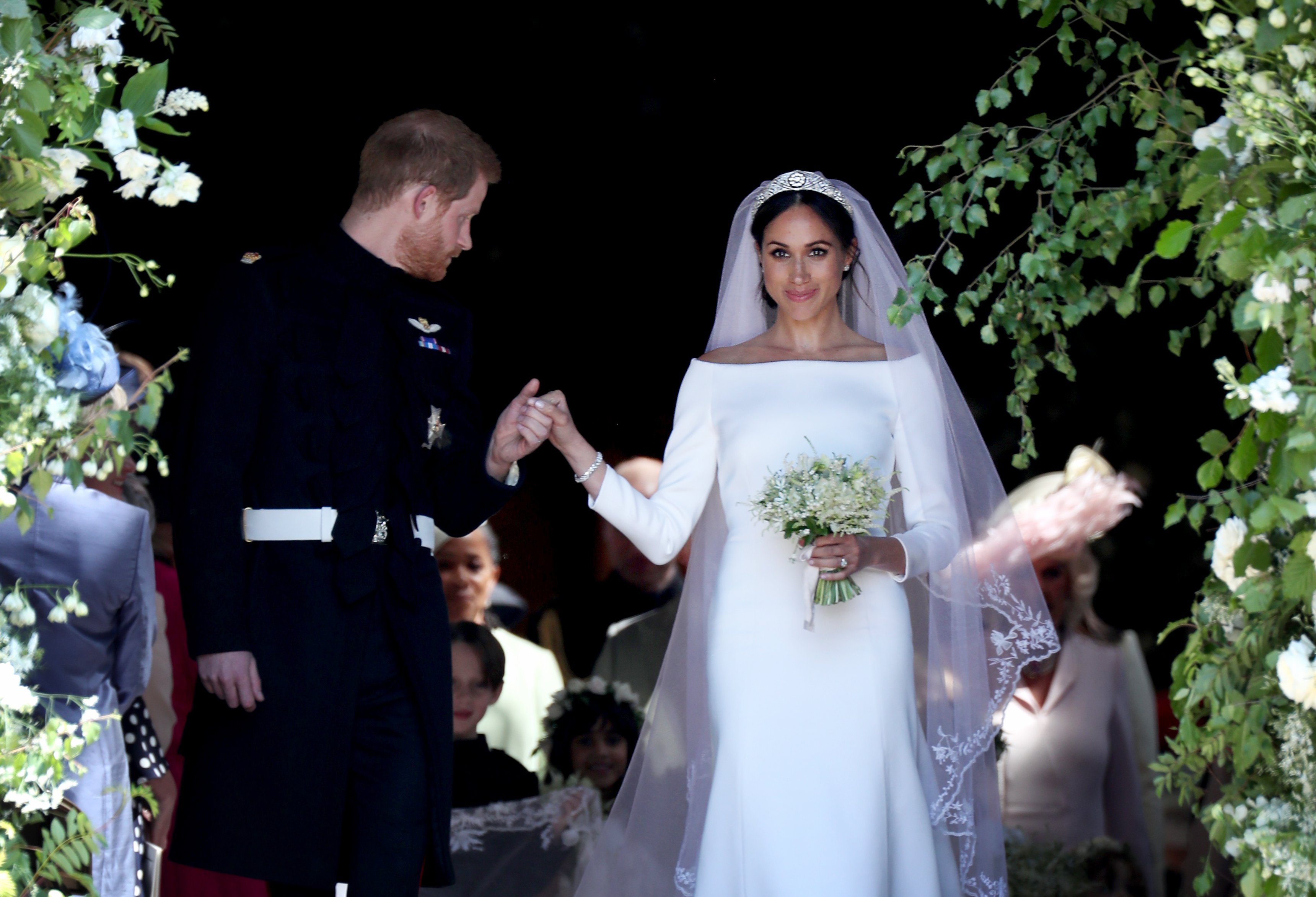 Image Source: Getty Images/Prince Harry and bride to be Meghan Markle